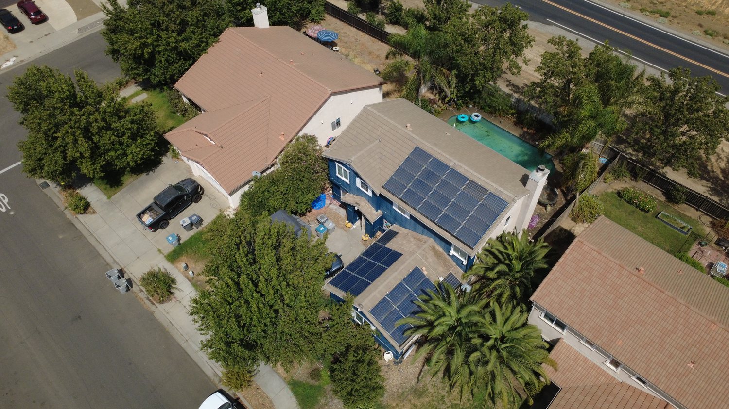 Property overview with pool and solar