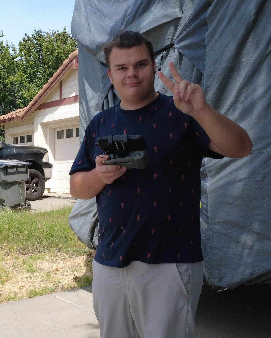 Jackson Hall, remote pilot, with his drone controller